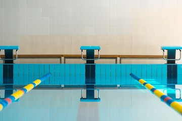 Starting blocks and lanes in a swimming pool