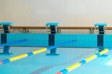 Starting blocks and lanes in a swimming pool