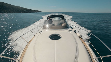 Man drives the yacht