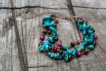 wrist bracelet of beads and precious stones