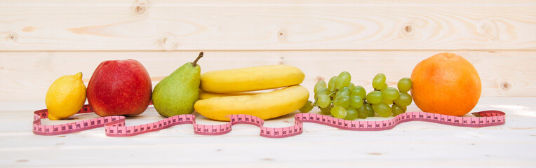 Fruits on a wooden background