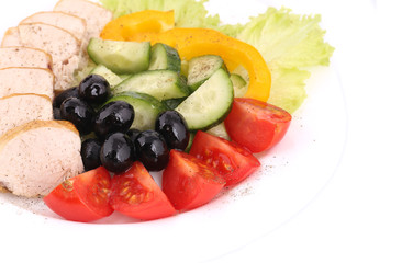 Chicken salad and vegetables.