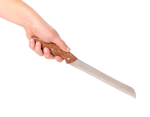 Hand holds knife for bread.