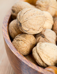 walnuts in a wooden bowl