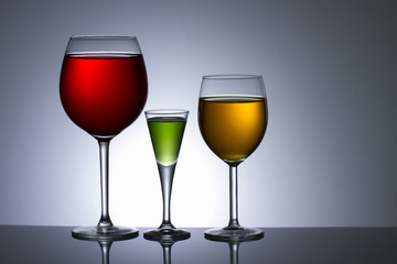 Three Colors of alcohol in glass