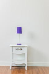 Lamp on bedside table