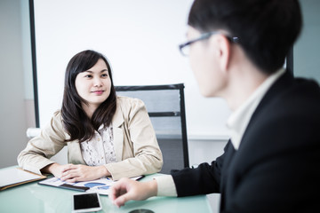 Successful young business executives meeting at the office