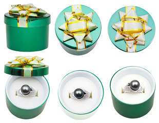 little round green box with black pearl ring