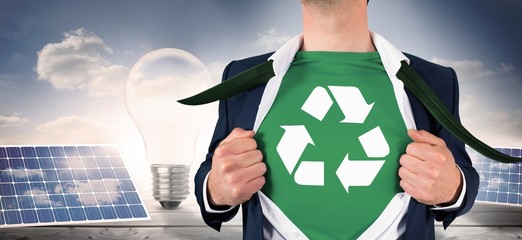 Composite image of businessman opening shirt in superhero style © WavebreakmediaMicro