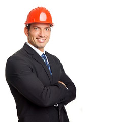 Handsome businessman in a protective helmet