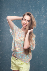 Woman standing on blue background