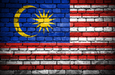 Brick wall with painted flag of Malaysia