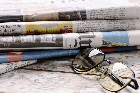 Glasses with the newspaper