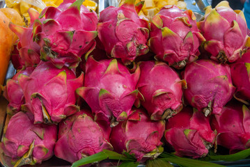 Dragon fruit on market stand, Thailand.