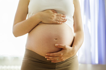 Pregnant woman at home