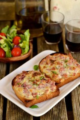 Warm open faced sandwiches with ham, cheese
