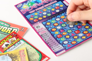 Scratching lottery tickets
