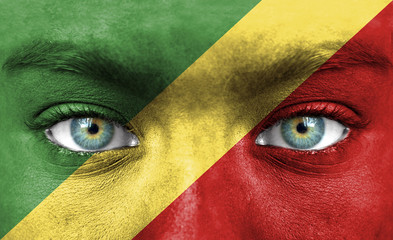 Human face painted with flag of Republic of the Congo