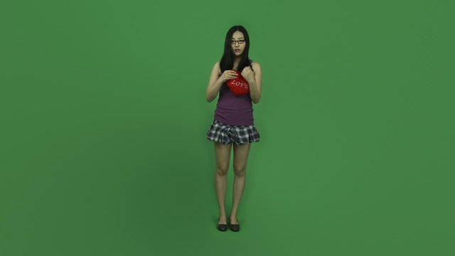 Asian student girl isolated greenscreen green background worried