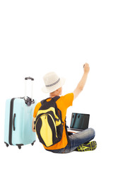 young man sitting on the floor and raise a hand to draw