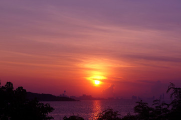 Fototapeta na wymiar silhouette on sunset tropical beach