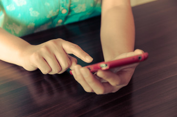 Mobile phone in a woman's hand