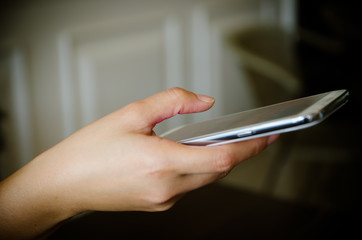 Mobile phone in a woman's hand