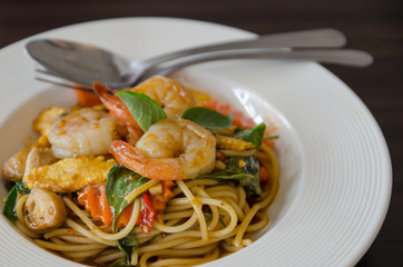 tasty hot and spicy spaghetti with cream, cheese and parsley