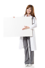 Asian doctor woman holding blank board