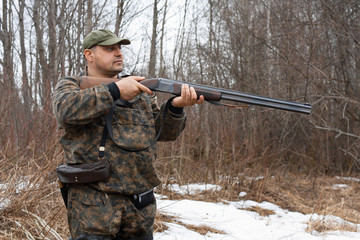 Fototapeta premium hunter with a gun