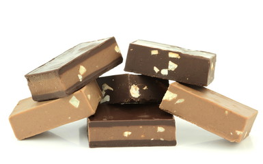 Chocolate pieces isolated on white background.