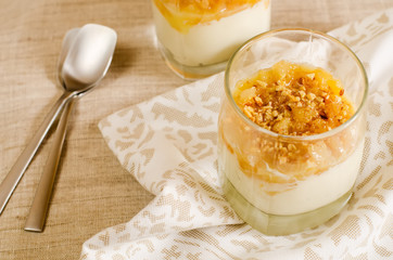 creamy dessert with caramelized pears and nuts