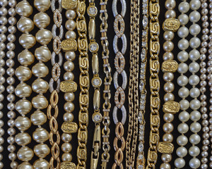 variety of golden jewelery closeup