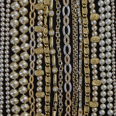 variety of golden jewelery closeup