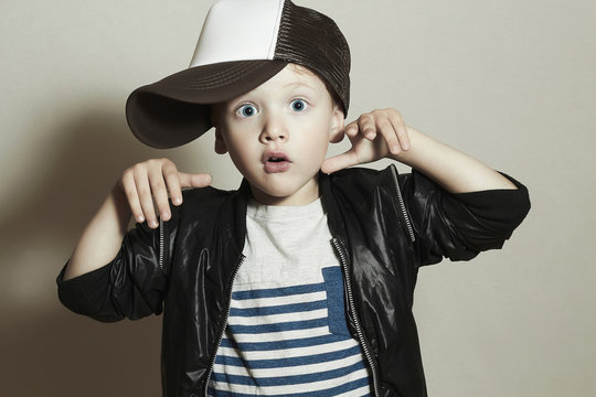 Funny little boy.Hip-Hop Style.fashion children.Child in Cap