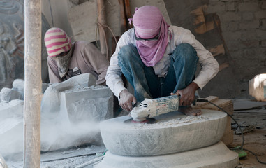 Stone carving workers
