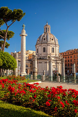 Fototapeta na wymiar Trajan's Column with church in Rome, Italy