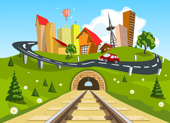 Railroad tracks through landscape to the city