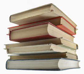 stack of old books isolated on white