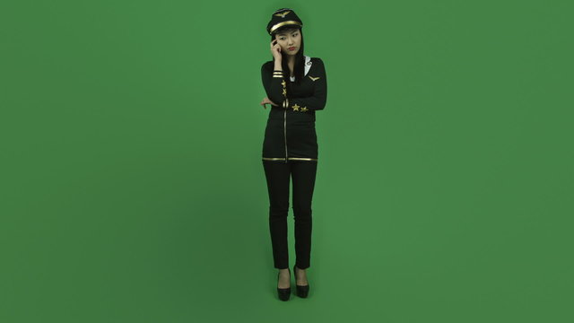 Asian air hostess isolated greenscreen green background thinking