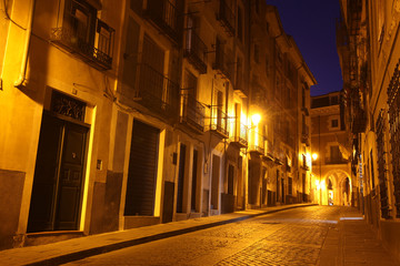 Fototapeta na wymiar Night view of picturesque old street in Cuenca. Spain