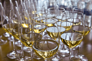 Glasses with wine on table
