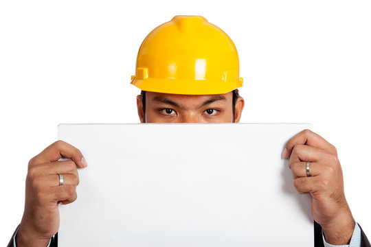 Asian engineer man show a blank sign close his lower face