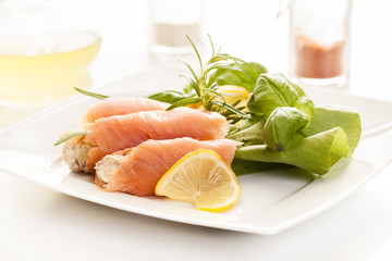 Smoked salmon roll with vegetable salad