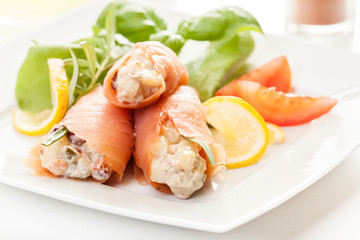 Smoked salmon roll with vegetable salad