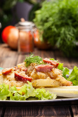 Scalloped potatoes with sausage and bacon