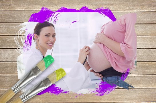 Composite image of pregnant woman at check up with doctor