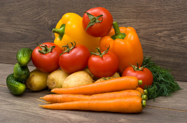 set of vegetables on wooden background