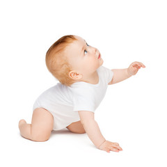 crawling curious baby looking up