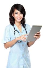 young nurse smiling while working